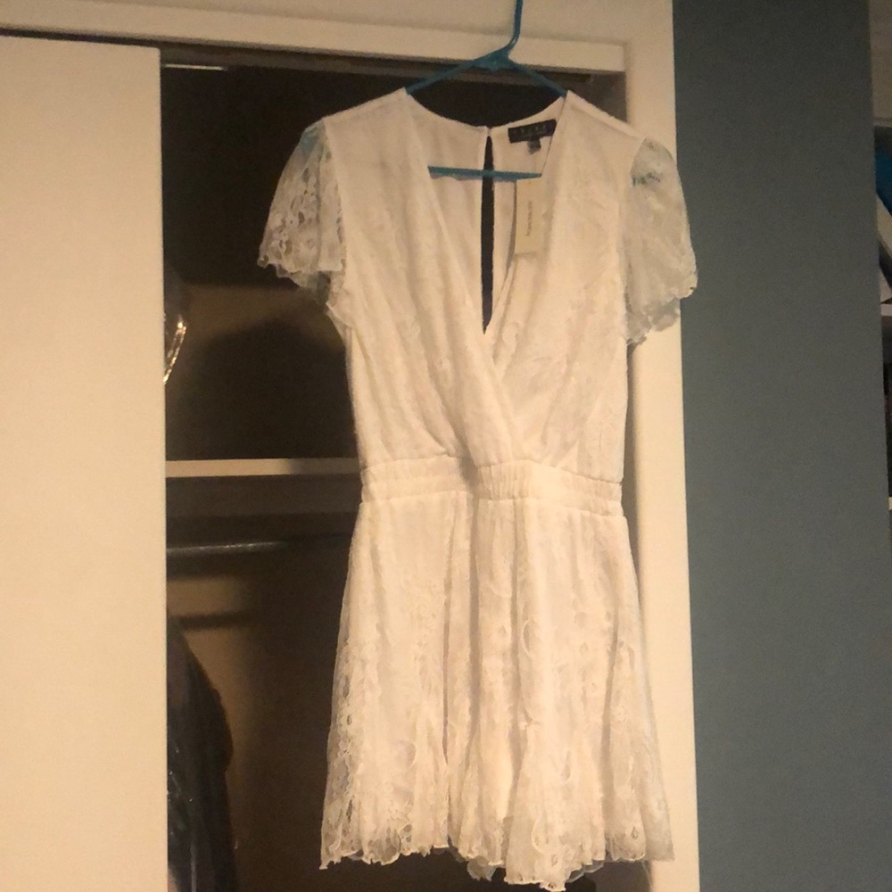 White Romper. Size M